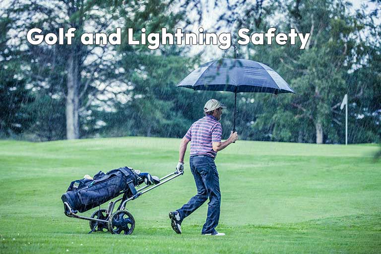 A golfer pulls a golf cart in the rain while holding an umbrella, staying alert for lightning. Text reads "Golf and Lightning Safety." Trees and a flag are visible in the background.