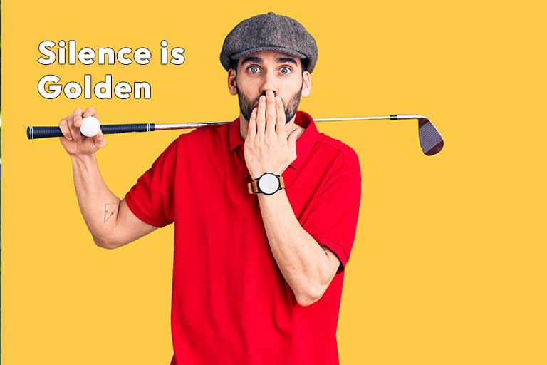 Man in a cap and red shirt holding a golf club over his shoulder, making a "quiet" gesture, with the text "silence is golden.